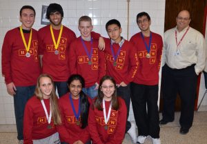 Medal winners!Left to right: Top - Dean Fulgoni, Sanjay Jonnavithula, Jake DiCicco, Max Lee, Rohan Savargaonkar, Mr. Caligiuri. Bottom - Andrea Ramsay, Sandhiya Kannan, Rose Bender.Picture by Matthew Schreiber.