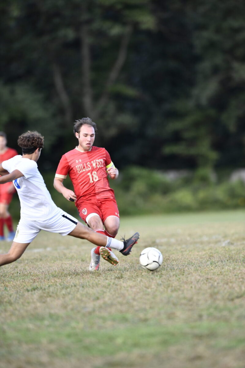 Senior Matthew Nacht makes a play against Comsewogue